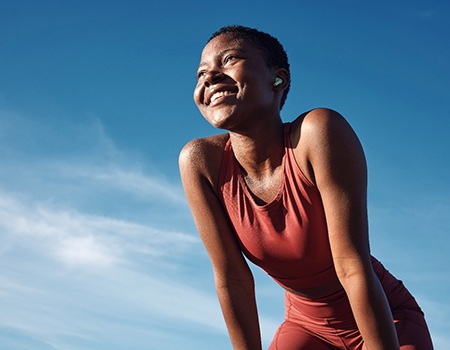 Lady smiles outdoors